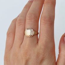 Load image into Gallery viewer, Talayee Fine Jewelry's Persepolis Signet ring in 14k yellow gold on figure. Handmade in San Francisco.