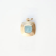 Load image into Gallery viewer, talayee fine jewelry persepolis pendant featuring a milky blue aqaumarine cabochon set in 14k gold in a triple bezel shown on a white background
