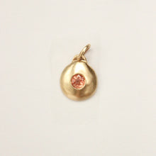 Load image into Gallery viewer, Talayee Fine Jewelry's domed charm pendant with a padparadscha sapphire flush set in 14k yellow gold