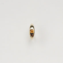 Load image into Gallery viewer, 14k gold and spessartite garnet huggie hoop earring handmade by talayee fine jewelry in san francisco on white background