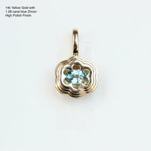 Load image into Gallery viewer, 14k yellow gold pendant with a blue zircon gemstone on a white background. Talayee Fine Jewelry's Bloom Pendant
