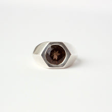 Load image into Gallery viewer, A silver-toned signet ring with a faceted hexagonal bezel holding a round, smokey quartz, shown on a clean white background.