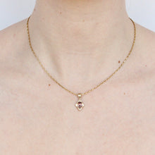 Load image into Gallery viewer, 14k yellow gold and rose zircon Tabriz Pendant handcrafted by Talayee Fine Jewelry, shown on a Barleycorn chain on figure.