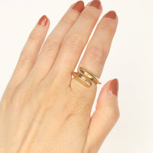 Load image into Gallery viewer, 14k solid gold knife edge crossover ring ring on figure.