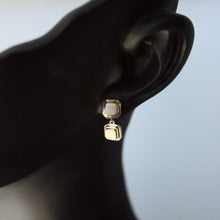Load image into Gallery viewer, Geometric drop earrings. Talayee Fine Jewelry's Persepolis drop earrings in 14k gold shown on figure against a light gray background.