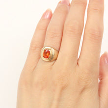 Load image into Gallery viewer, Talayee Fine Jewelry's Signature Persepolis Gemstone Signet ring with a orange sapphire set in 14k yellow gold that can be the ultimate cool girl engagement ring. Bold gold jewelry for her and for him.