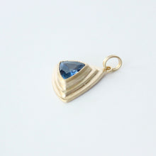 Load image into Gallery viewer, talayee fine jewelry's ooak persepolis pendant featuring a blue trillion cut sapphire set in 14k gold shown on a white background