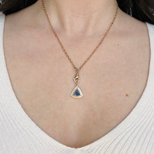Load image into Gallery viewer, talayee fine jewelry's ooak persepolis pendant featuring a blue trillion cut sapphire set in 14k gold shown on figure