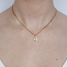 Load image into Gallery viewer, talayee fine jewelry's persepolis pendant featuring an imperial topaz set in 18k gold shown on figure