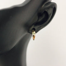 Load image into Gallery viewer, 14k gold and peridot huggie hoop earring handmade by talayee fine jewelry in san francisco