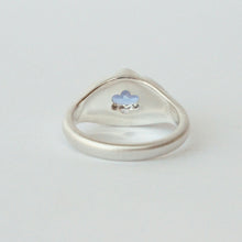 Load image into Gallery viewer, sterling silver Bloom ring by Talayee Fine Jewelry set with a Tanzanite on a grey background