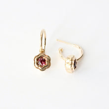 Load image into Gallery viewer, Gold floral earrings with pink gemstones on a white background