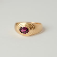 Load image into Gallery viewer, Talayee fine jewelry's persepolis ring featuring an oval purple pink garnet set in a 14k three tier bezel ring on a white background