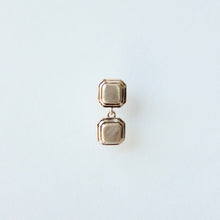 Load image into Gallery viewer, Geometric drop earrings. Talayee Fine Jewelry's Persepolis drop earrings in 14k gold shown on a light gray background.