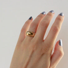 Load image into Gallery viewer, Chunky gold ring on hand. Prounis trade ring.