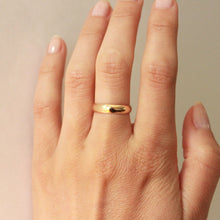 Load image into Gallery viewer, womens solid gold 4mm vow ring band on finger. best place to buy jewelry reddit