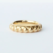 Load image into Gallery viewer, A gold band ring with a textured raised pear shape pattern, photographed on a clean white background. Talayee Fine Jewelry's Atousa Ring
