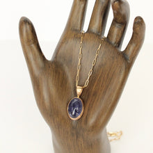 Load image into Gallery viewer, 14k gold tanzanite pendant on a 14k gold paperclip chain necklace. handmade jewelry in san francisco.
