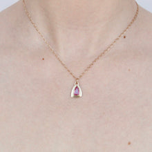 Load image into Gallery viewer, talayee fine jewelry&#39;s persepolis pendant featuring a hot pink sapphire set in 14k gold on figure
