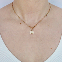 Load image into Gallery viewer, 14k yellow gold Persepolis Charm Pendant on a 16&quot; Matchstick Chain
