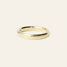 Load image into Gallery viewer, 18k Gold beveled ring on a light gray background
