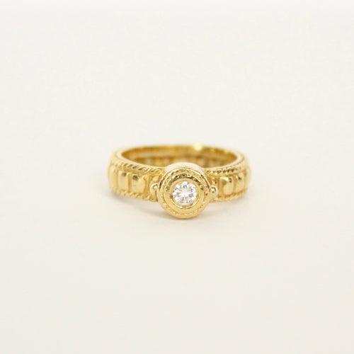 vintage 18k gold pinky ring with brilliant cut diamond