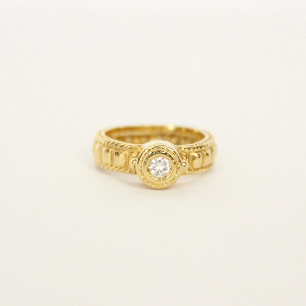 vintage 18k gold pinky ring with brilliant cut diamond