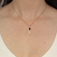 Load image into Gallery viewer, Talayee Fine Jewelry&#39;s latest iteration of the Persepolis Pendant design featuring three gemstones, a rhodolite garnet, champagne diamond, and pink spinel. Handmade in San Francisco in 14k solid gold.
