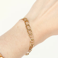 Load image into Gallery viewer, 14k gold anchor link chain bracelet on model
