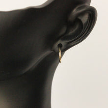 Load image into Gallery viewer, 14k gold flexible tube hoops on mannequin
