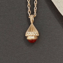 Load image into Gallery viewer, Talayee Fine Jewelry's Atousa Bell Pendants featuring a carnelian cabochon set in 18k with the signature texture design shown on a dark gray background
