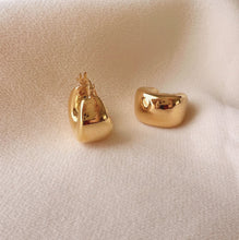Load image into Gallery viewer, 14k gold wide puffed huggie hoop earrings by Talayee Jewelry.

