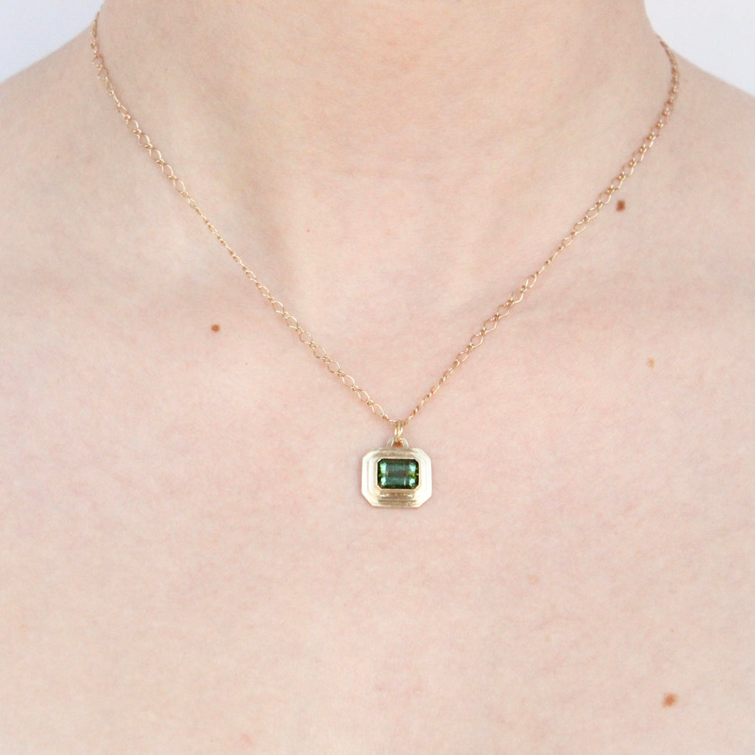 14k gold and emerald cut green tourmaline persepolis pendant by talayee fine jewelry