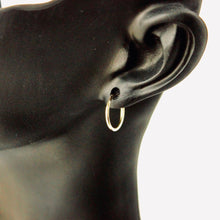 Load image into Gallery viewer, 14k gold flexible tube hoops on mannequin

