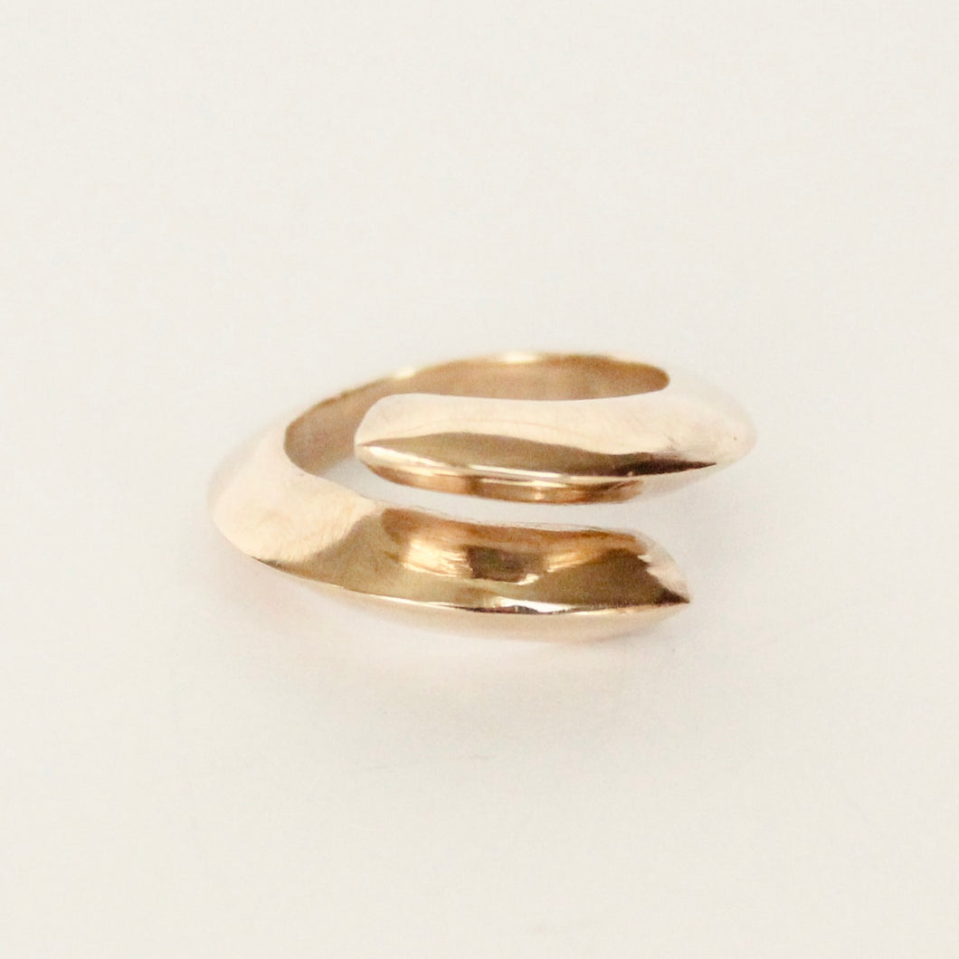 14k yellow gold knife edge crossover statement ring on white background. affordable Prounis Trade ring