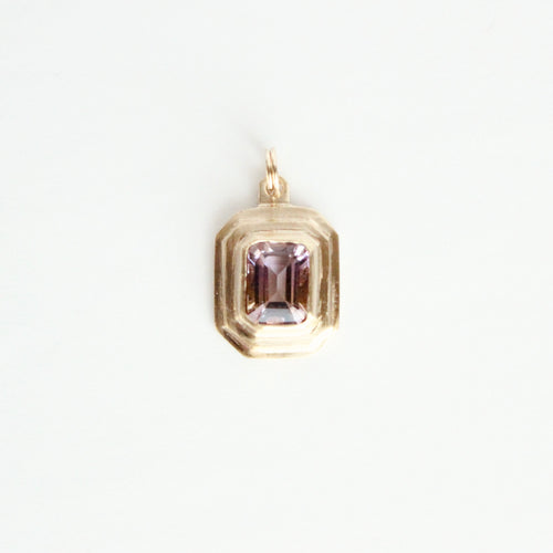 talayee fine jewelry's bestselling persepolis pendant with an emerald cut amethyst set in 14k yellow gold