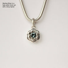 Load image into Gallery viewer, Talayee Fine Jewelry's Petite Bloom Charm. A sterling silver floral charm set with a gray spinel shown on a silver snake chain against a white background.
