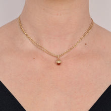 Load image into Gallery viewer, Talayee Fine Jewelry's Atousa Bell Pendants featuring a carnelian cabochon set in 18k with the signature texture design shown worn on a chain on figure
