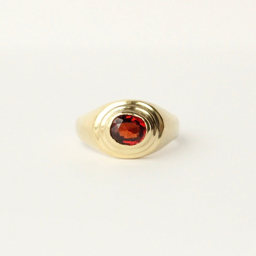 talayee fine jewelry's persepolis ring featuring a red spinel set in 18k gold shown on a white background