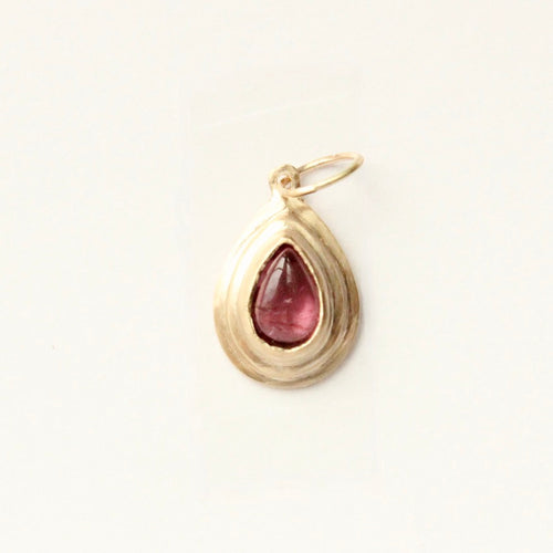 Talayee Fine Jewelry's Persepolis Pendant with a pear pear shaped tourmaline set in 14k yellow gold on a white background