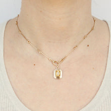 Load image into Gallery viewer, talayee fine jewelry&#39;s bestselling persepolis pendant with an emerald cut citrine set in 14k yellow gold on figure with the matchstick chain
