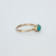 Load image into Gallery viewer, side view of talayee fine jewelry&#39;s darya ring which is a 14k yellow gold ring featuring a bezel set round chrysocolla gem.
