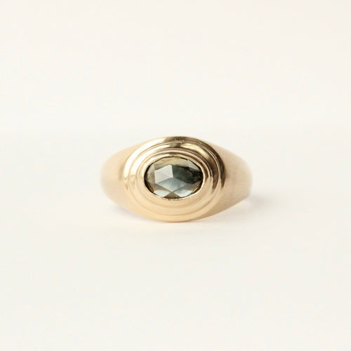 talayee fine jewelry's persepolis ring featuring a rose cut montana sapphire set in 14k gold shown on a white background