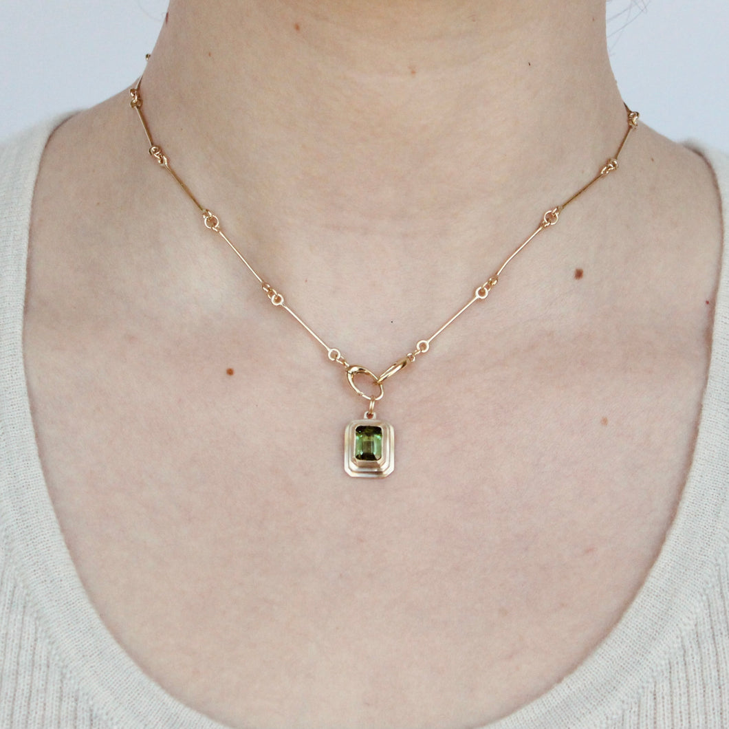14k gold and green emerald cut tourmaline pendant from talayee fine jewelry's persepolis collection