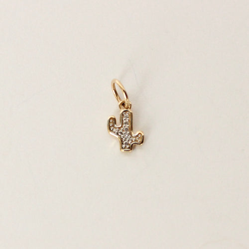 14k gold cactus charm with tiny diamond on white background