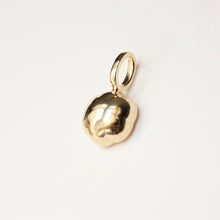 Load image into Gallery viewer, Talayee Fine Jewelry&#39;s Bloom Pendant. 18k yellow gold pendant with an orange garnet set in a floral style setting styled on a snake chain shown on figure.
