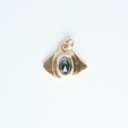 Talayee fine Jewelry's Persepolis Evil Eye Pendant in 14k gold with a rosecut montana sapphire