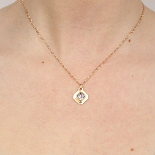 talayee fine jewelry's persepolis pendant featuring a lavender spinel set in 14k yellow gold