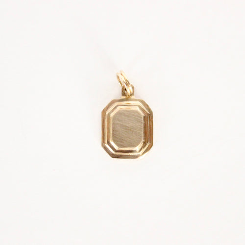 Talayee Fine Jewelry's handmade Persepolis charm pendant is a solid 14k gold engraveable geometric pendant.