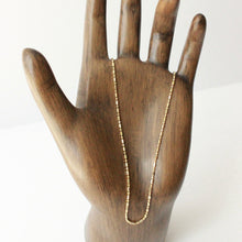 Load image into Gallery viewer, 14k gold 16&quot; long layering chain necklace on vintage wooden hand display. Best handmade jewelry in san francisco. affordable gold jewelry.
